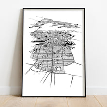 Load image into Gallery viewer, A black and white illustrated print of Auckland City laid out on white paper framed in a black frame leaning on a white wall and wooden flooring.