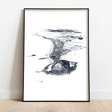 Load image into Gallery viewer, A black and white illustrated print of Mt Maunganui laid out on white paper framed in a black frame leaning on a white wall and wooden flooring.