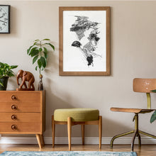 Load image into Gallery viewer, A black and white illustrated print of Pauanui laid out on white paper within a wooden frame, hung on a beige wall above seating area.