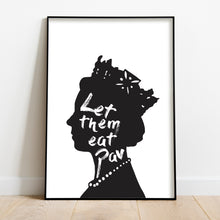 Load image into Gallery viewer, Black silhouette illustration of a Queen Elizabeth II in profile wearing a crown and pearl necklace. Inside the silhouette, white brushstroke text reads "Let them eat Pav." Laid out on white paper framed in a black frame leaning on a white wall and wooden flooring.