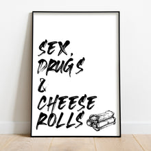Load image into Gallery viewer, A black and white illustrated print of the words ’Sex, Drugs & Cheese Rolls’ in a big font with graphic of cheese rolls at the bottom on a white background. The print is displayed in a black frame, positioned against a white wall on a wooden floor.