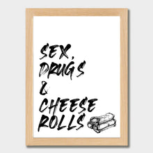 Load image into Gallery viewer, A black and white illustrated print of the words ’Sex, Drugs & Cheese Rolls’ in a big font with graphic of cheese rolls at the bottom on a white background. The print is laid out on white paper within a wooden frame against a white wall above a table setting.